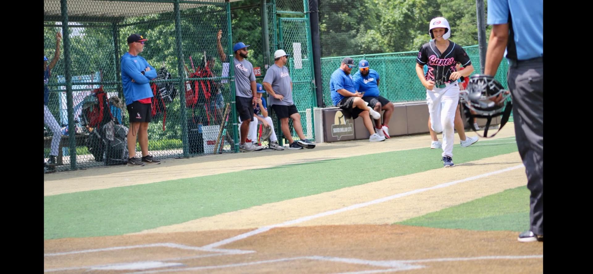 Cooper Smith crossing home plate